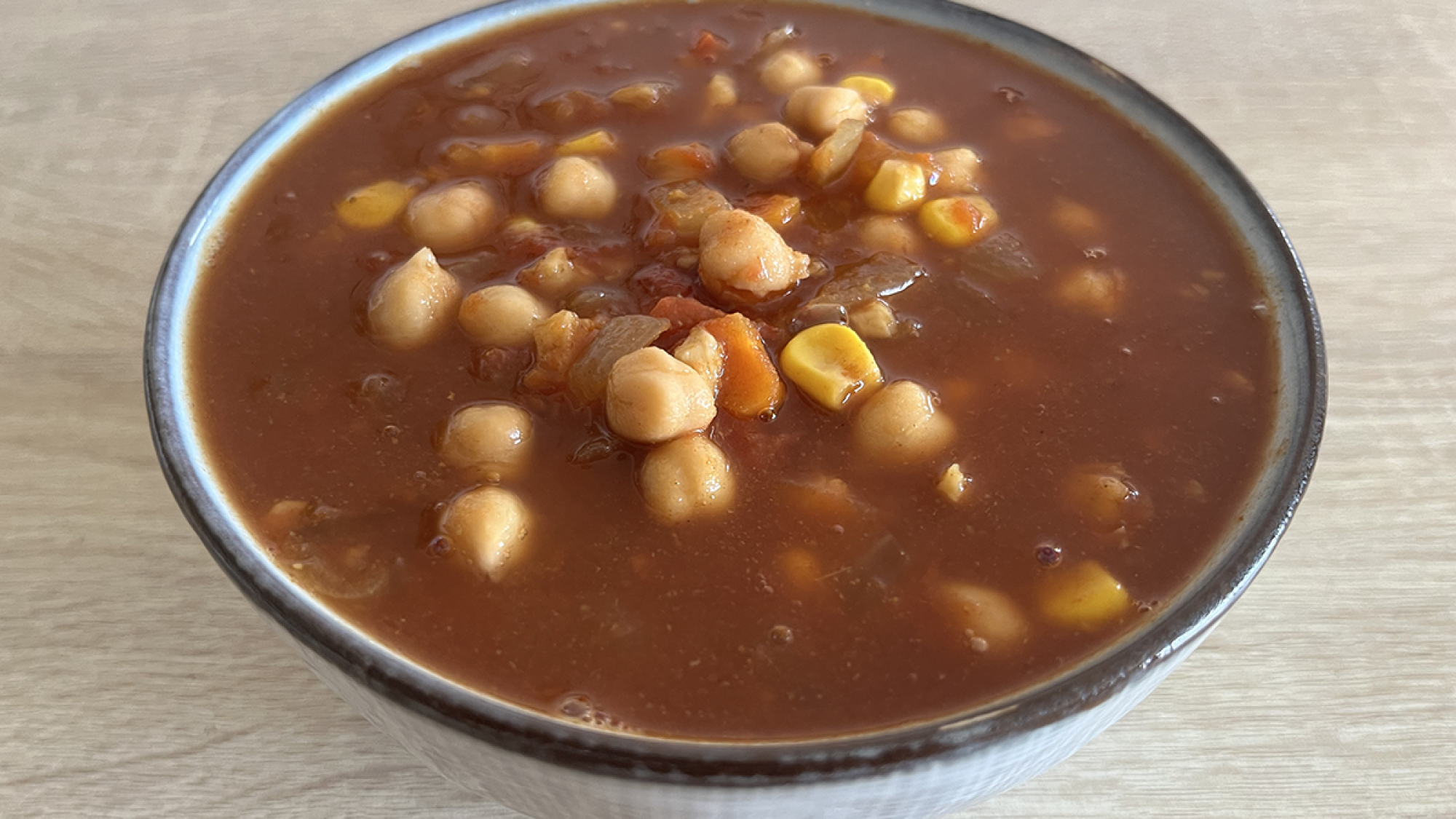 Healthy low calorie chickpea vegan soup with mexican flavour